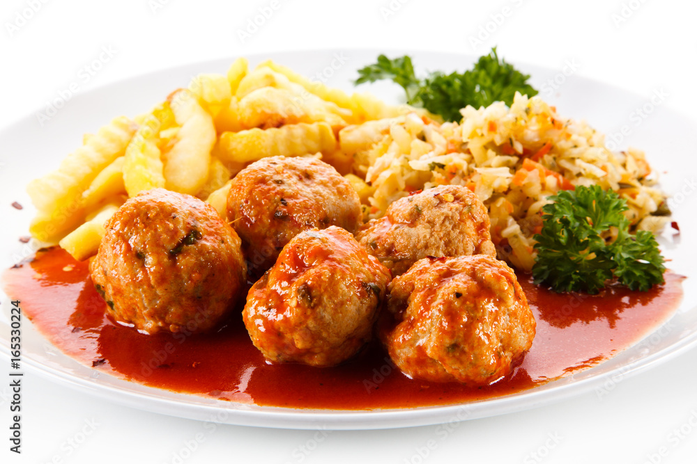 Meatballs with french fries and vegetables Meatballs with french fries and vegetables