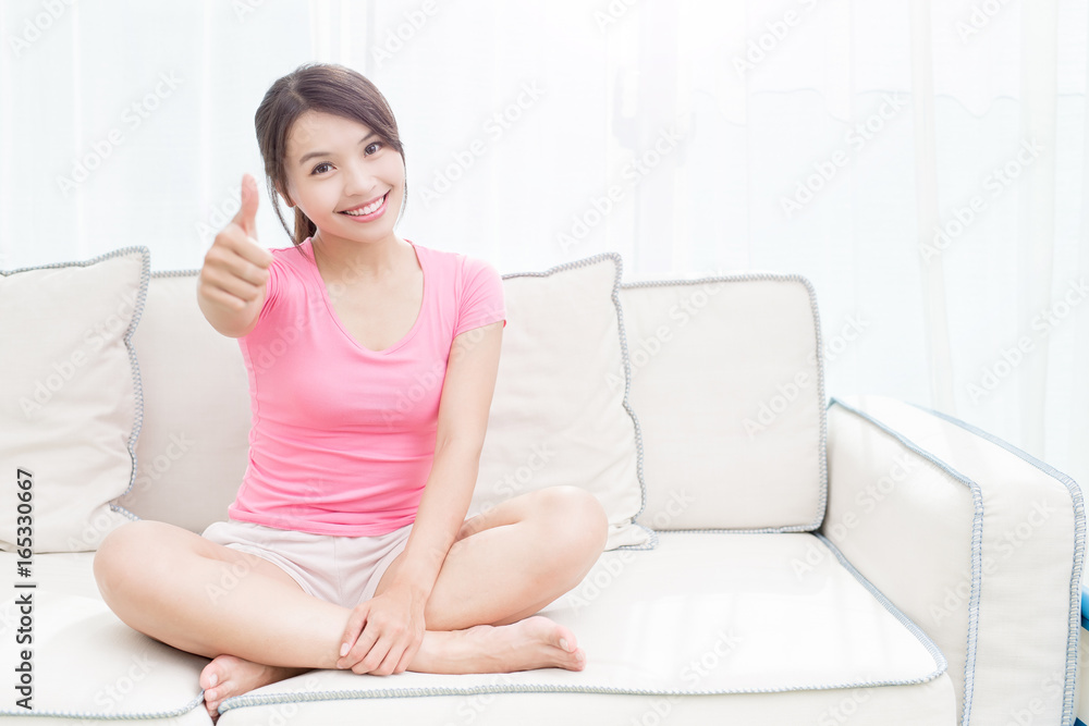 woman sit on sofa