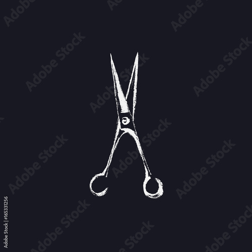 Chalk scissors painted against blackboard.