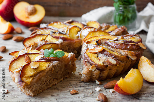 Pie with peaches and almonds photo