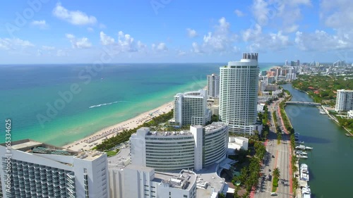 Aerial video beachfront resorts Miami Beach Florida 4k 24p photo