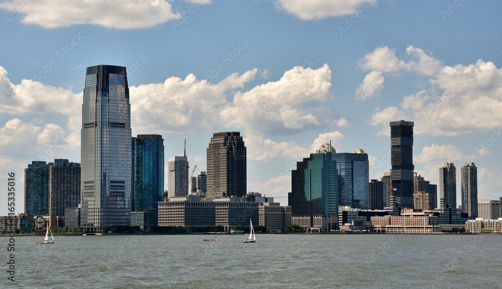 The skyline of Jersey City, New Jersey across the Hudson River Stock Photo  | Adobe Stock