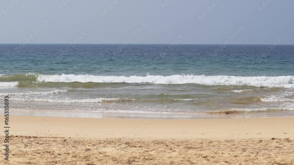 Gentle Waves wash Tropical Beach Paradise in Sri Lanka Gentle Waves wash Tropical Beach Paradise in Sri Lanka