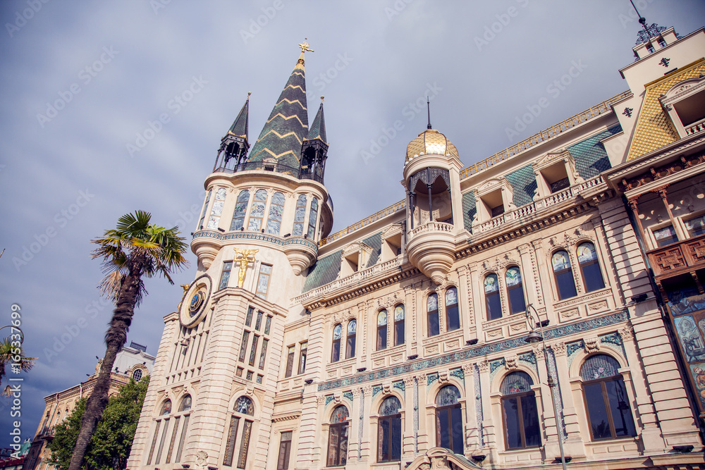 The former National Bank building with the famous astronomical clock tower is the pearl of the city center