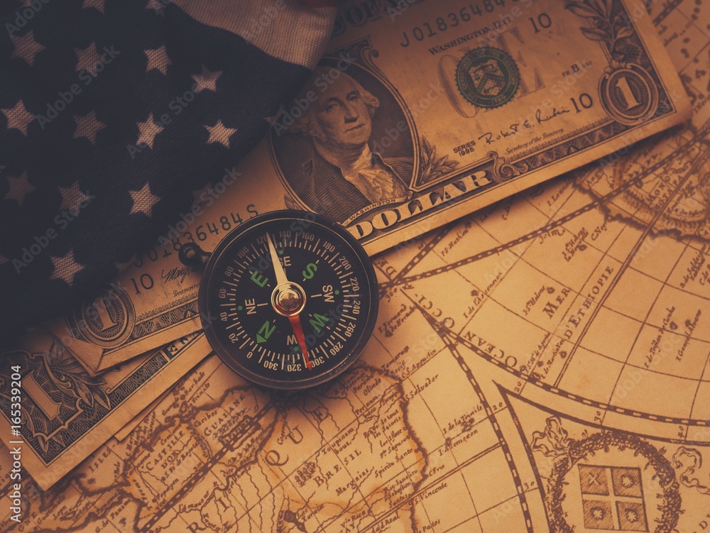 Antique pirate world map and new modern compass concept travel around the  world with one dollar money of United States of America, vintage vintage  Stock Photo | Adobe Stock