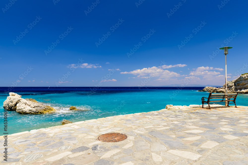 The picturesque coastline and blue sea, Kokkari village, Samos island, Greece