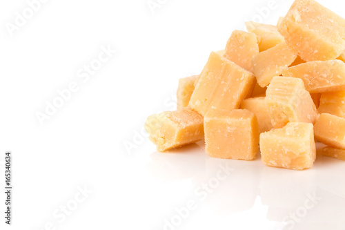 Parmesan cheese on white background