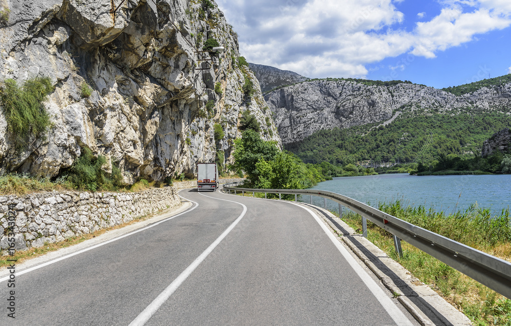 Fototapeta premium truck on the mountain highway.