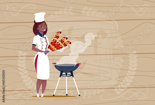 Female African American Chef Cook Holding Kebab Cartoon Chief In Restaurant Uniform Over Wooden Textured Background Flat Vector Illustration