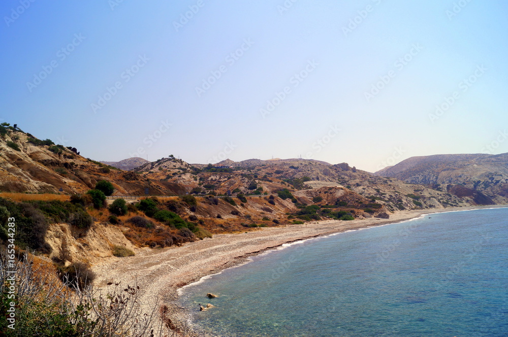 Aphrodite Bay. Beautiful beach located next to the Rock of the Greek, the birthplace of the goddess Aphrodite, Cyprus. Aphrodite Bay. Beautiful beach located next to the Rock of the Greek, the birthplace of the goddess Aphrodite, Cyprus.