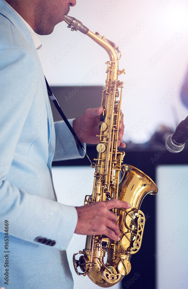 Fototapeta premium A man with saxophone