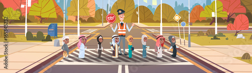 Policeman Guard Helping Group Of Arab School Children To Cross Road On Crosswalk Vector Illustration
