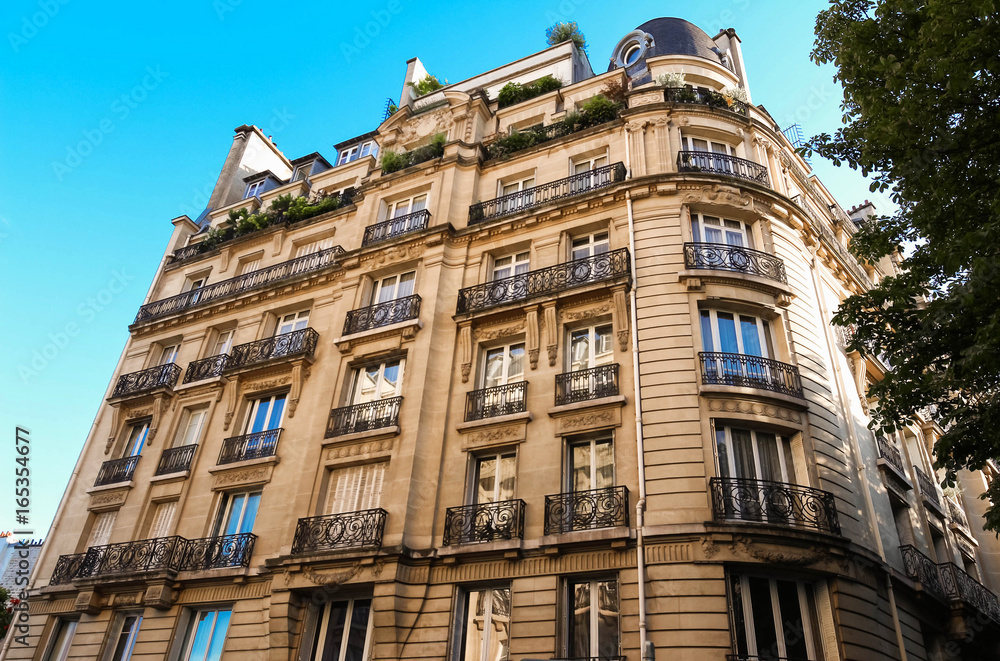 The facade of Parisian building, France.