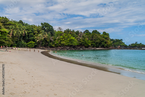 MANUEL ANTONIO, COSTA RICA - MAY 13, 2016: Tourists on a beach in National Park Manuel Antonio, Costa Rica