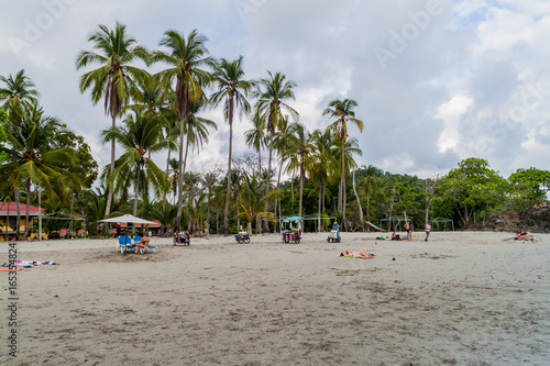 MANUEL ANTONIO  COSTA RICA - MAY 13  2016  People on a beach in Manuel Antonio village  Costa Rica