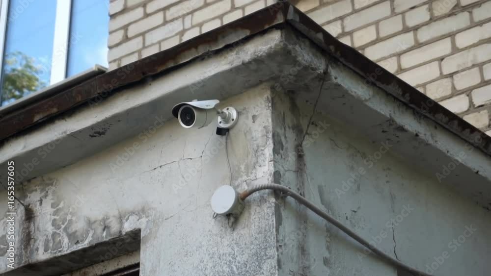 surveillance camera on the wall of children's art school. surveillance camera on the wall of children's art school.