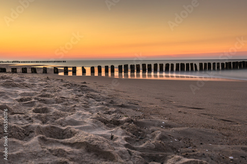 Fototapeta Naklejka Na Ścianę i Meble -  Baltic sea at beautiful sunrise in Poland beach.
