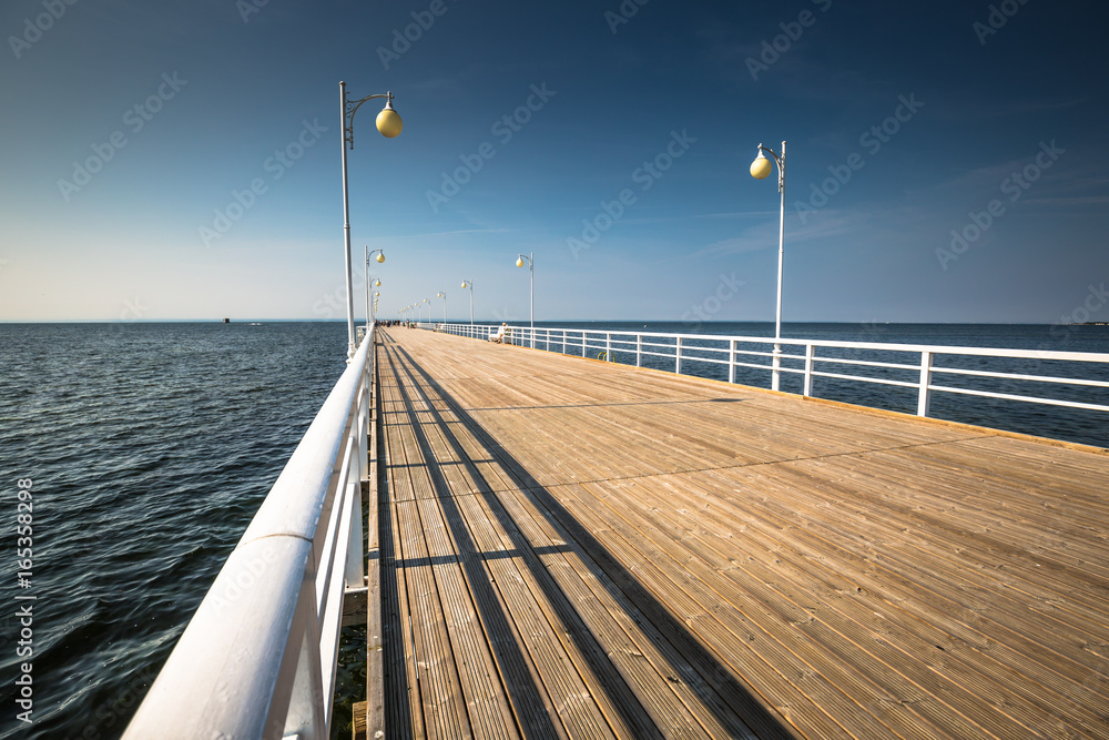 Wooden pier in Jurata town on coast of Baltic Sea, Hel peninsula, Poland