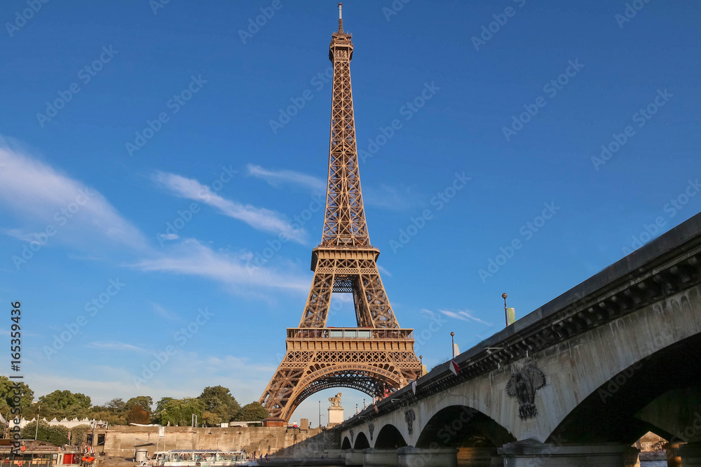 The famous Eiffel Tower and Iena bridge ,Paris, France.