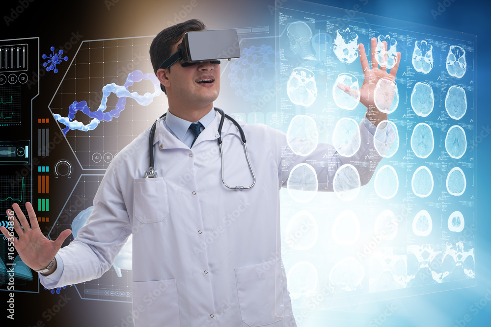 Doctor examining x-ray images using virtual reality glasses Doctor examining x-ray images using virtual reality glasses