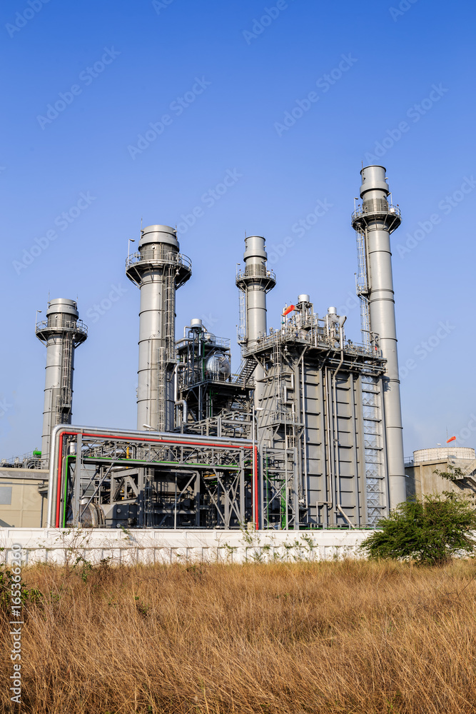 Gas turbine electrical power plant at dusk with blue sky
Gas turbine electrical power plant at dusk with blue sky