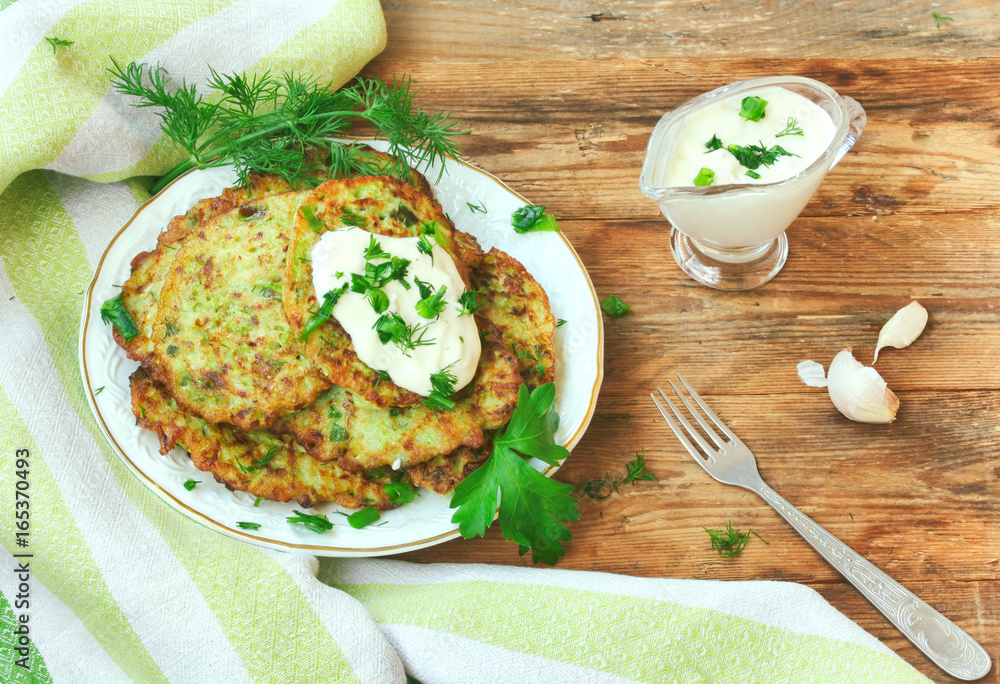 Homemade fried fritters from courgettes Homemade fried fritters from courgettes