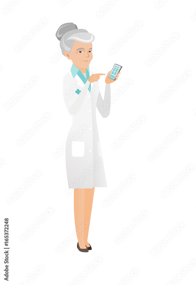 Senior caucasian doctor holding a mobile phone. Senior caucasian doctor holding a mobile phone.