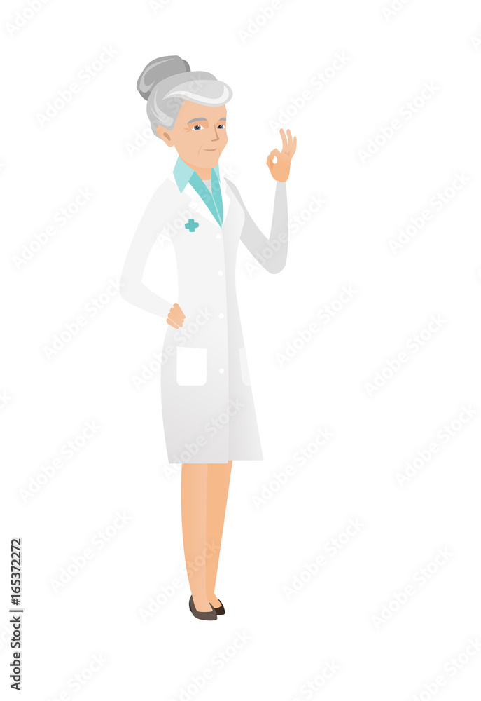 Senior caucasian doctor showing ok sign. Senior caucasian doctor showing ok sign.