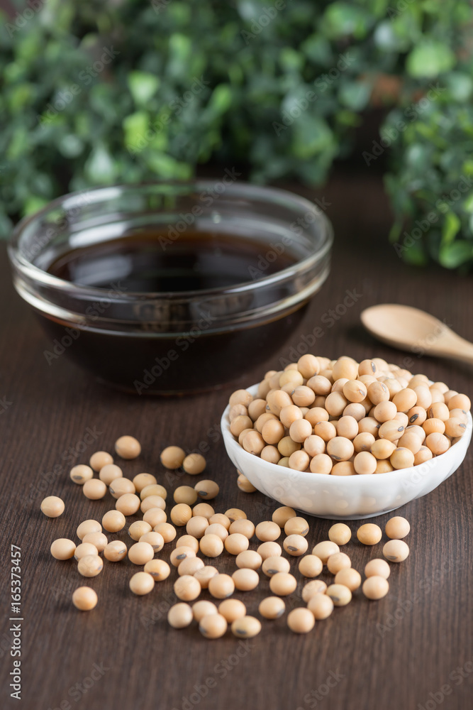 Soy bean with soy sauce on wood table. Soy bean with soy sauce on wood table.