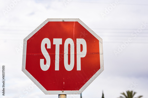 road sign stop on a sky background photo