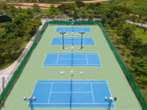 blue tennis court for play in stadium