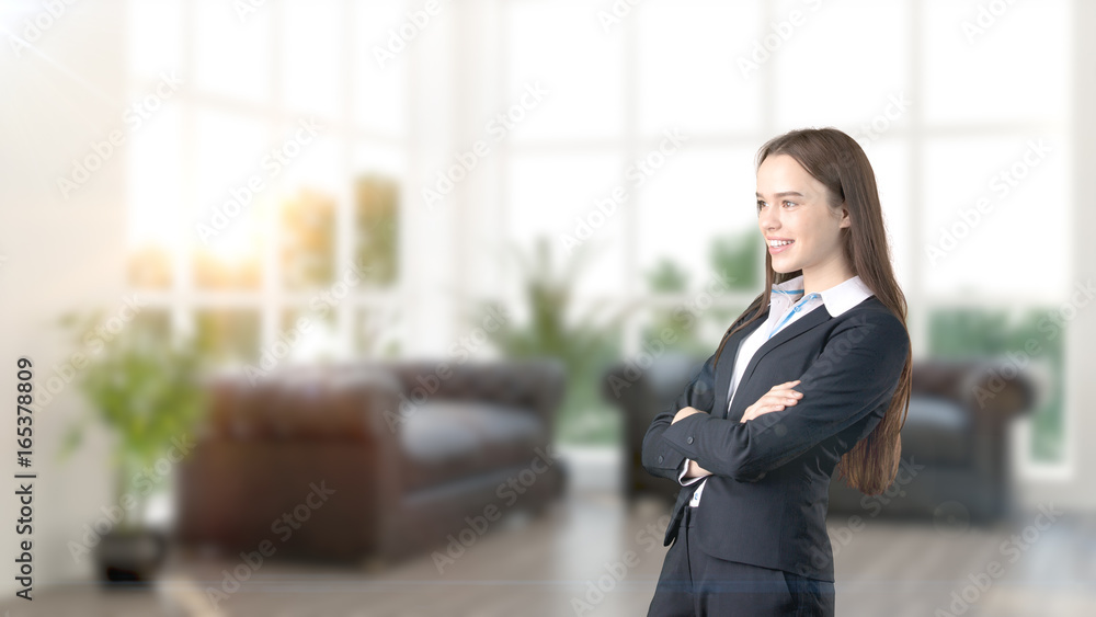 Young beautiful business woman and creative designer standing over blured interior background Young beautiful business woman and creative designer standing over blured interior background