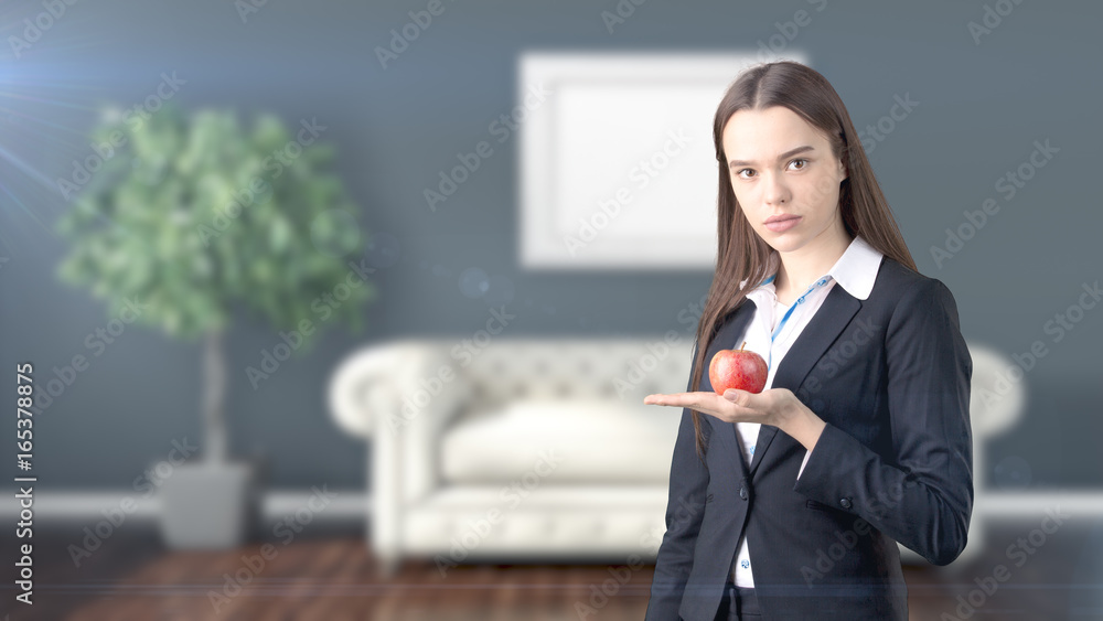 Young beautiful business woman and creative designer standing over blured interior background Young beautiful business woman and creative designer standing over blured interior background