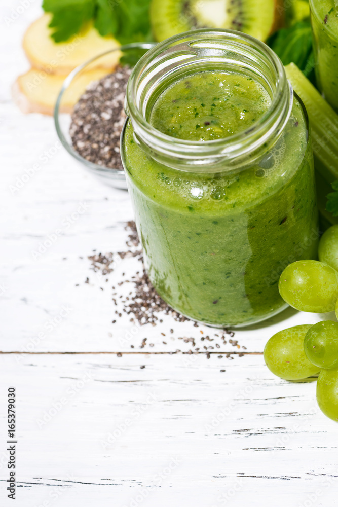healthy green fruit and vegetable smoothies on white background, vertical top view healthy green fruit and vegetable smoothies on white background, vertical top view