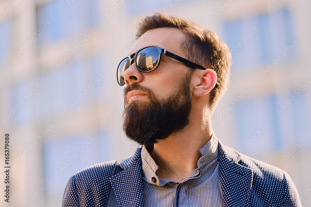 Portrait of bearded male in sunglasses. Portrait of bearded male in sunglasses.