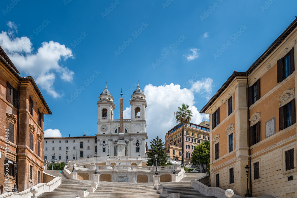 Piazza di Spagna and spanish steps to Piazza della Trinita dei Monti with no people a sunny summer day