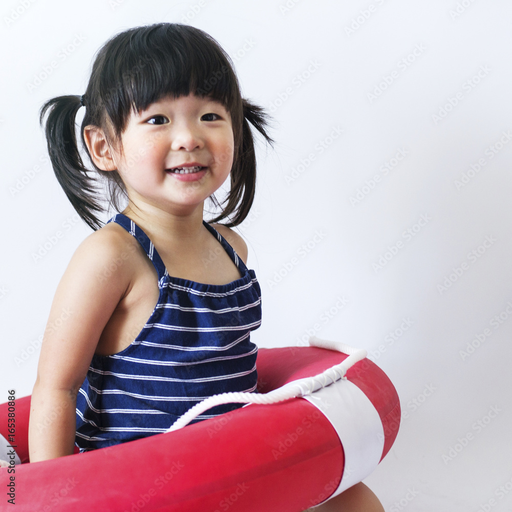 innocent  japanese Cute and innocent japanese kid with life ring on white background Stock  Photo | Adobe Stock