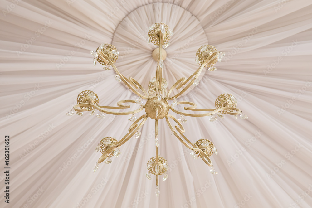 Close-up of a beautiful white crystal chandelier