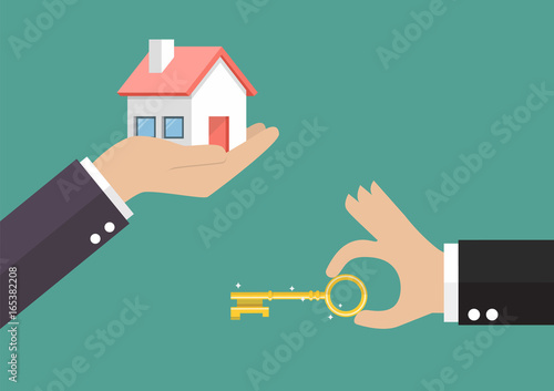 Hands with house and hands with key