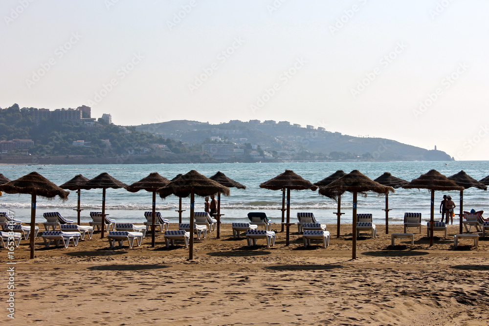 The Torreon Beach in Benicassim, a beach resort in the Costa del Azahar coast, province of Castello, Spain The Torreon Beach in Benicassim, a beach resort in the Costa del Azahar coast, province of Castello, Spain