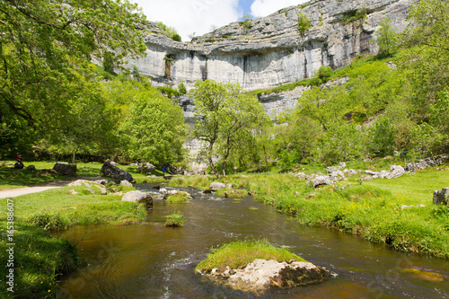 Malham Cove with the stream at the bottom of the rocks Yorkshire Dales National Park UK photo