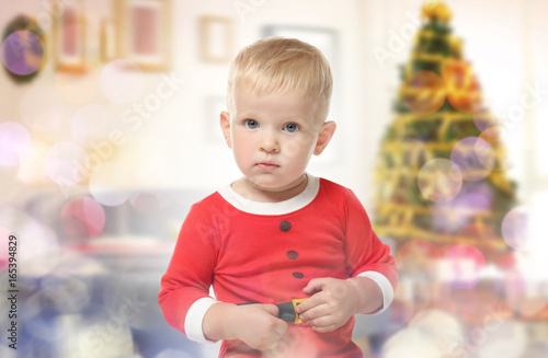 Cute baby in costume of San...