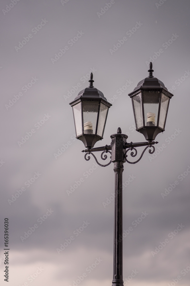 Vintage Street Lamp with Early Raining Background in the Evening