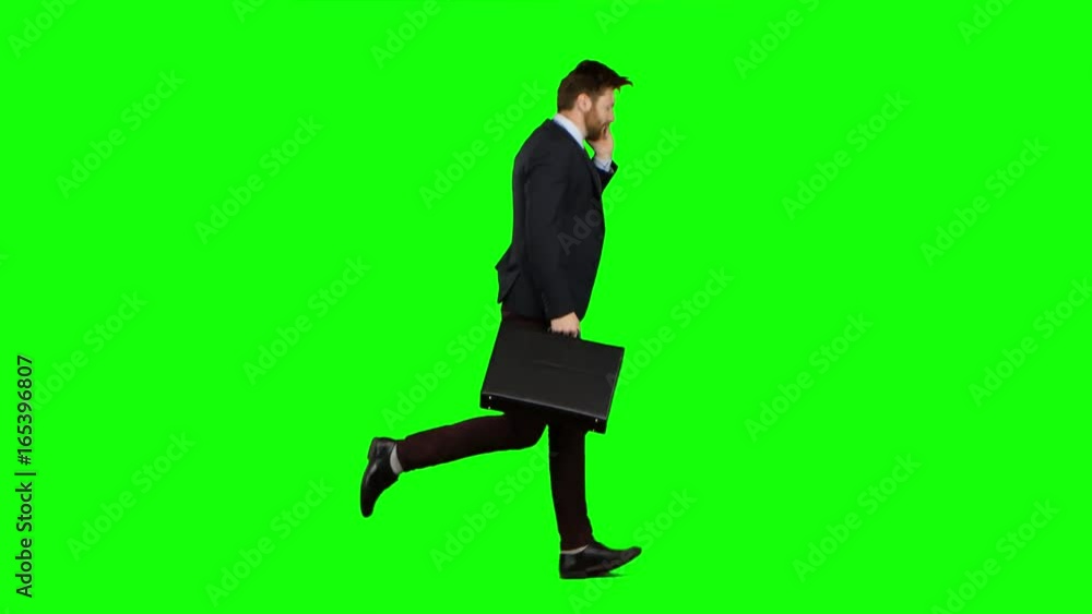 Man is running to work, understands that he is late and begins to run. Green screen Man is running to work, understands that he is late and begins to run. Green screen