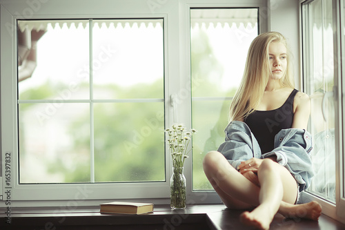 Window sitting young adult girl at home Free Download Window sitting young adult girl at home - GFXLoad