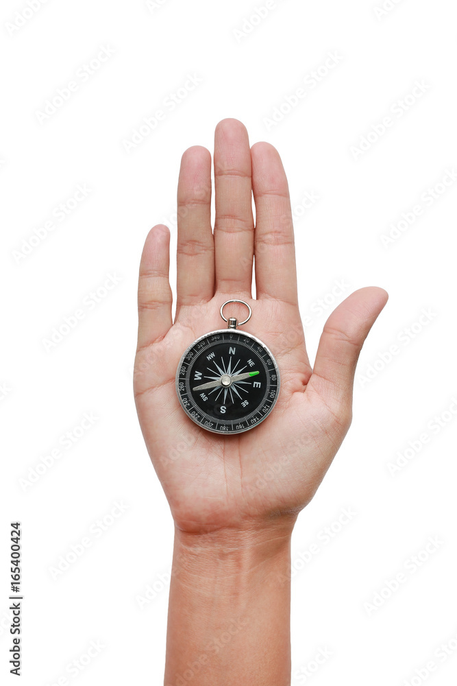 Compass in hand on a white background close-up. Compass in hand on a white background close-up.