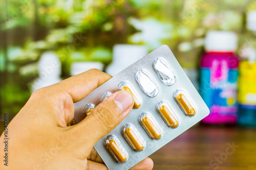 Drug prescription for treatment medication. Pharmaceutical medicament, cure in container for health. Pharmacy theme, capsule pills with medicine antibiotic in packages.