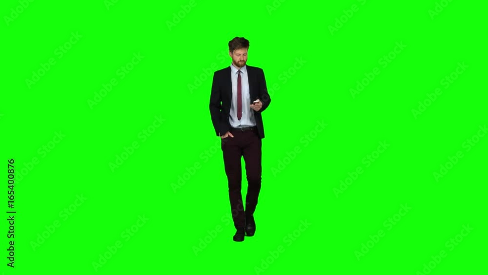 Guy looks at the photo on the phone and finds a list of pictures. Green screen Guy looks at the photo on the phone and finds a list of pictures. Green screen