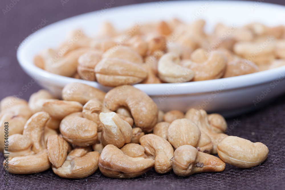 stack of Cashews on bowl stack of Cashews on bowl
