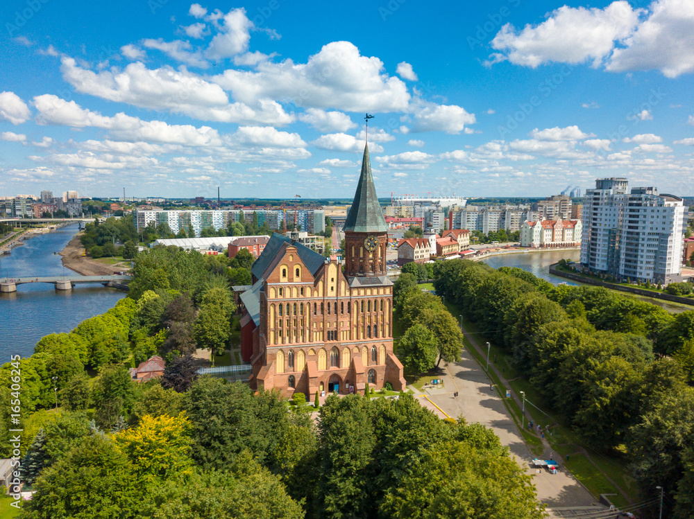 Naklejka premium Aerial cityscape of Kant Island in Kaliningrad, Russia at sunny summer day with white clouds in the blue sky
